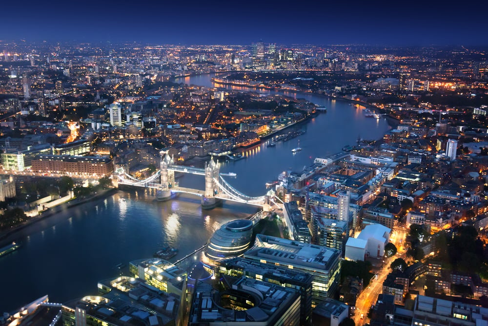 London at night with urban architectures and Tower Bridge